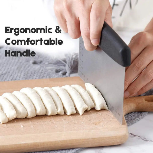 Person using a dough scraper with an ergonomic handle to cut dough on a wooden board.